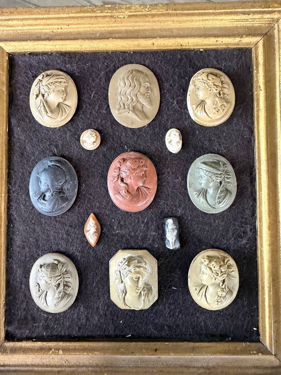 Collection of cameos and intaglios, shells and lava stones, around 1900.