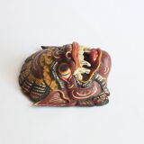 Two polychrome painted and gold leaf gilded Barong dance masks from Bali, Indonesia.