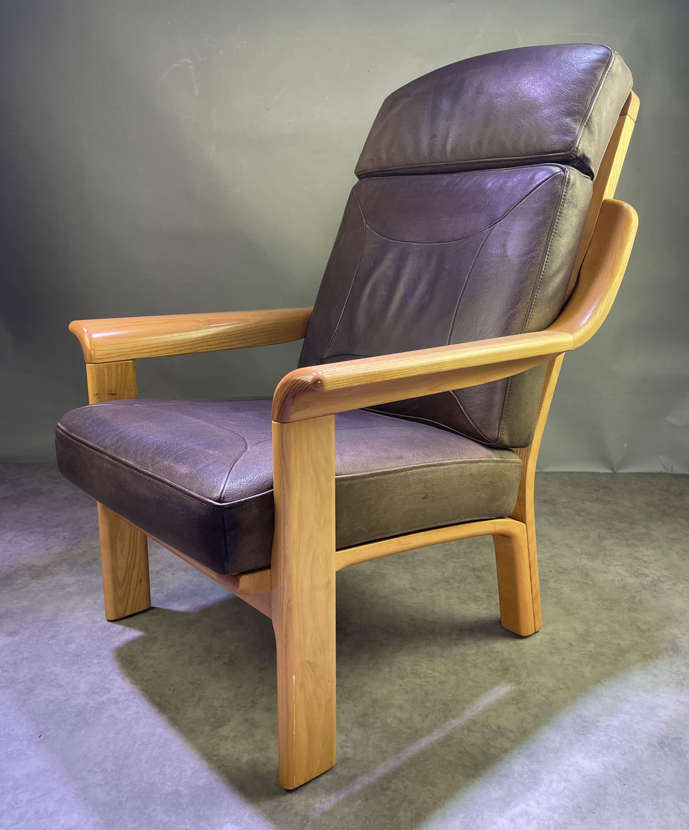 Chocolate leather armchair, wooden structure