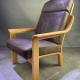 Chocolate leather armchair, wooden structure
