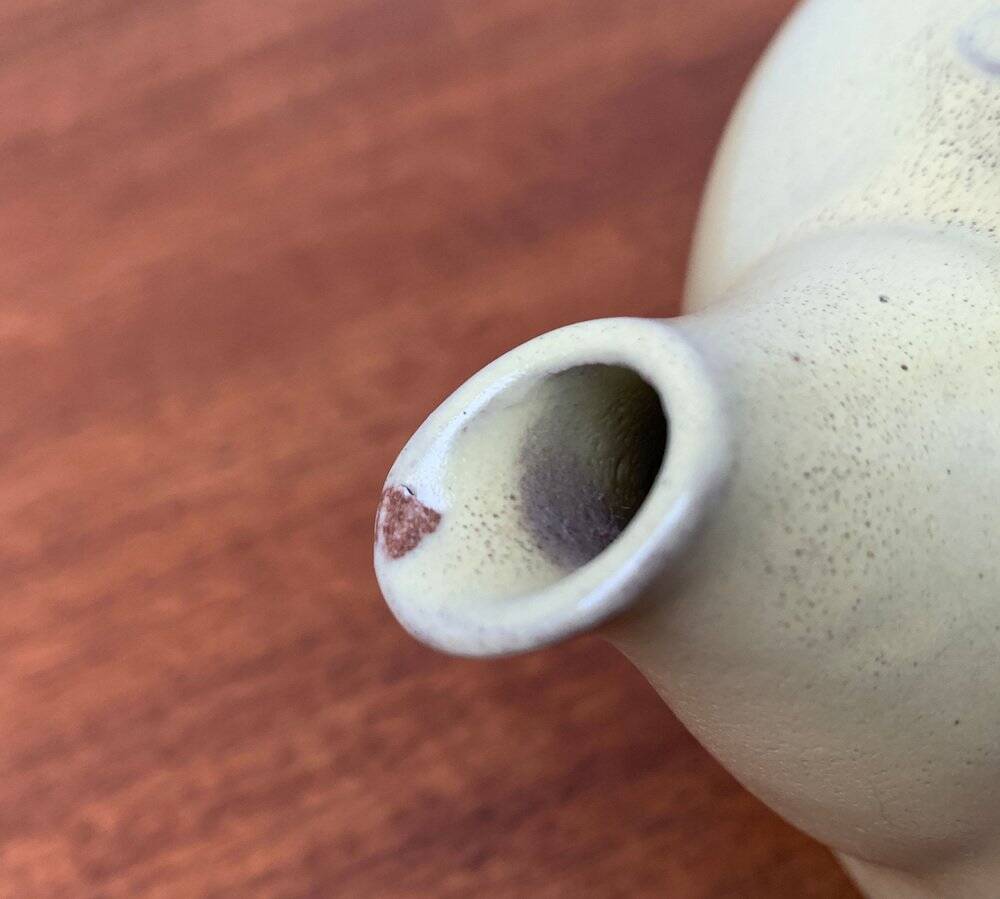 Mid-century ceramic teapot with bamboo handle, 1960s.