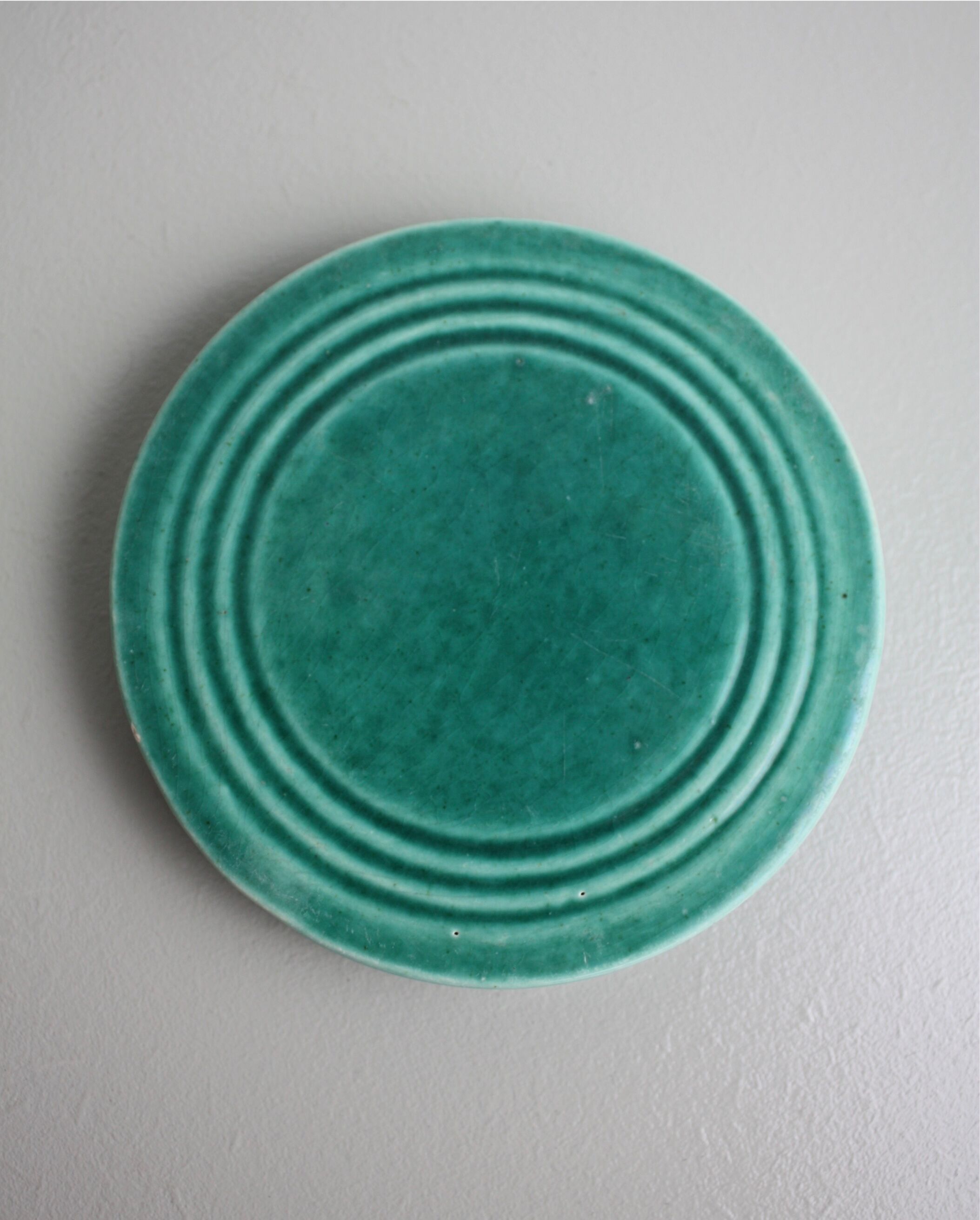 Set of 4 coasters in glass in green earthenware