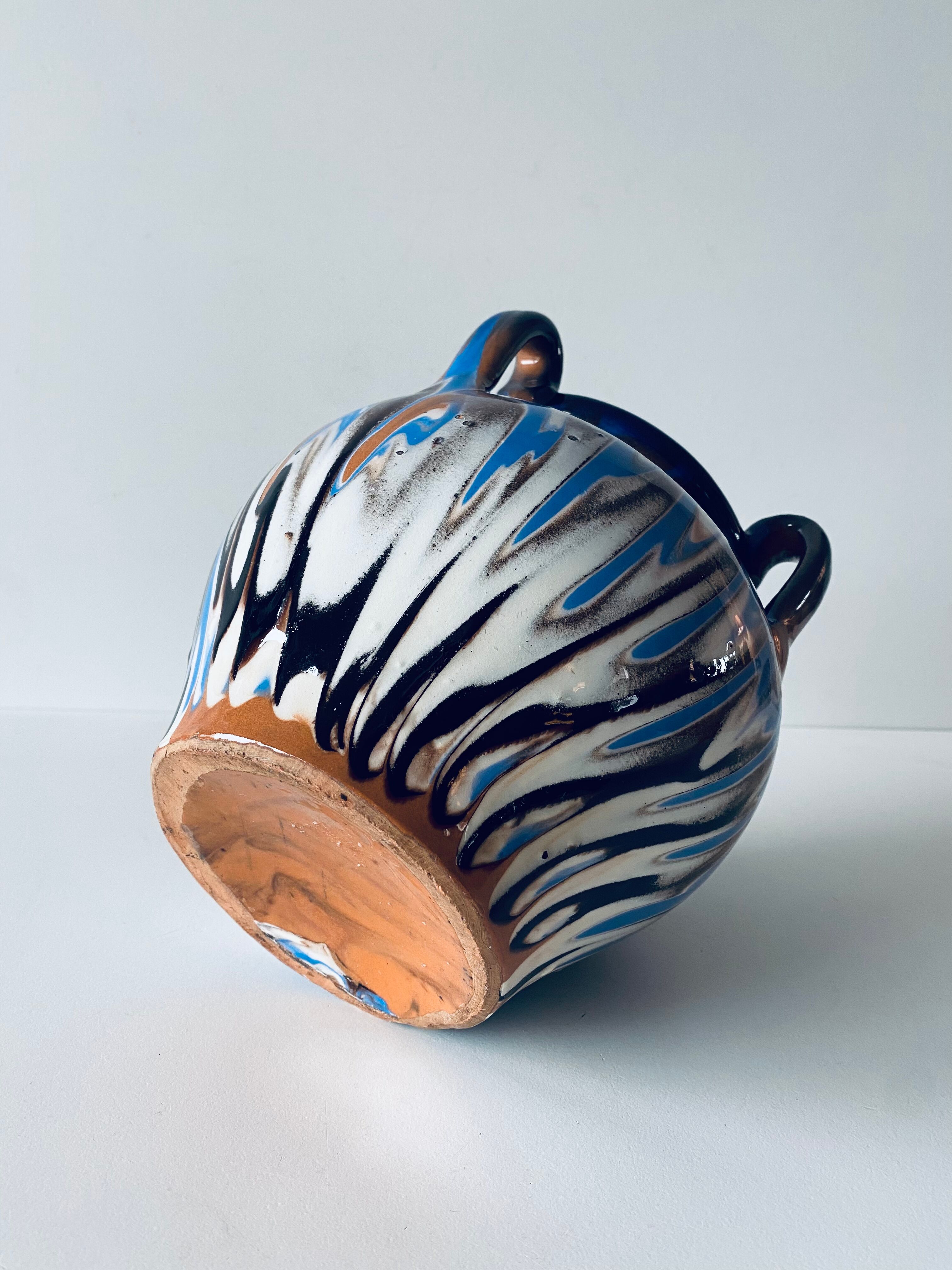 Vase old colors mixed with handles