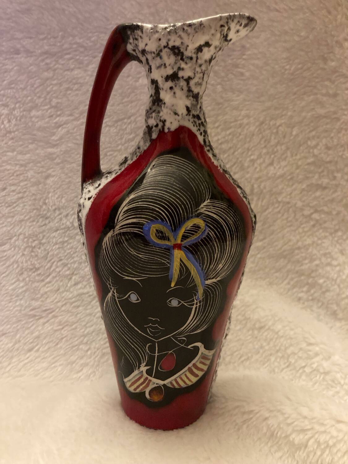 Vintage vase, made of glazed lava stone.