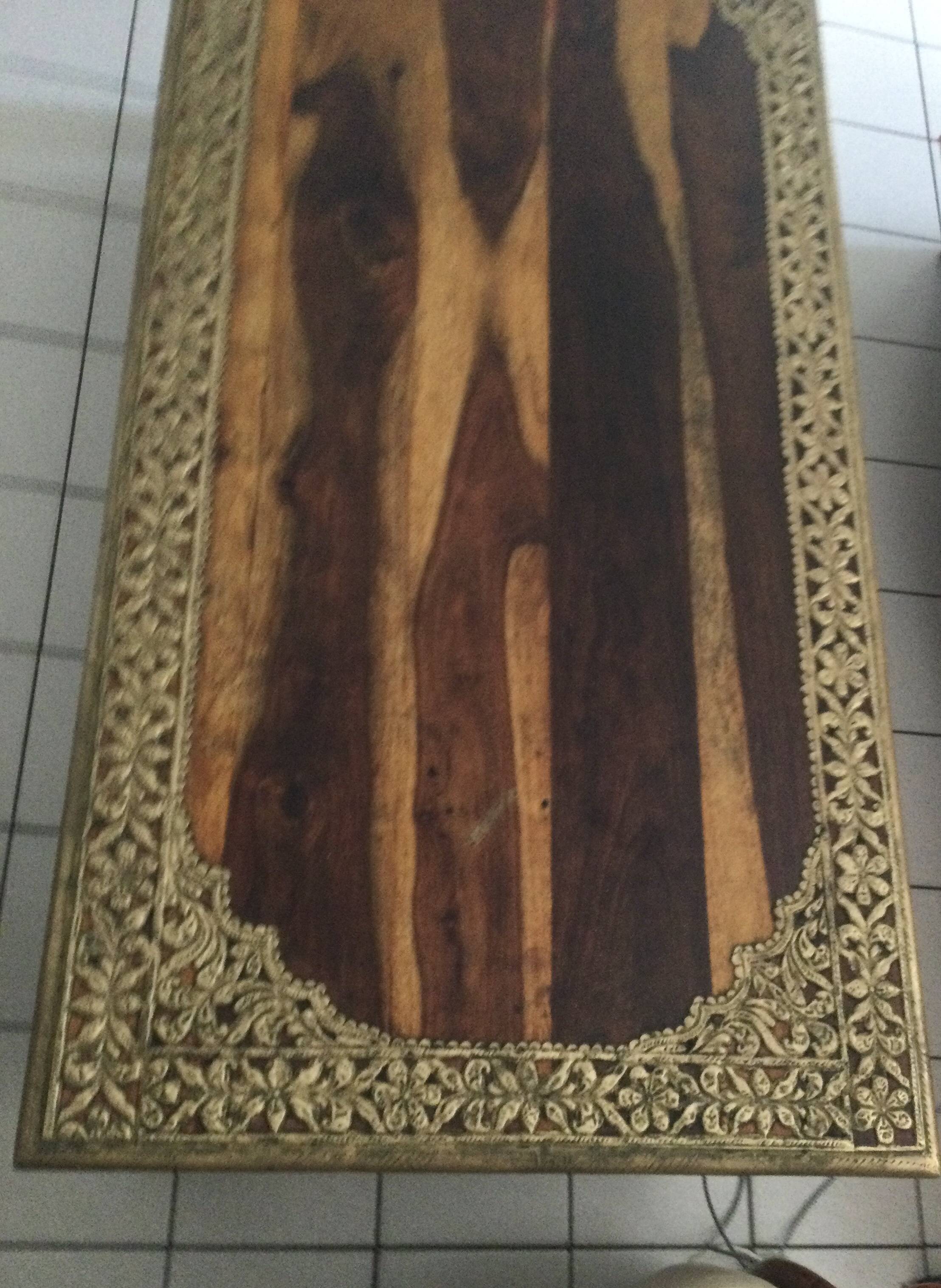 Large vintage Indian coffee table made of solid sheesham wood and brass.