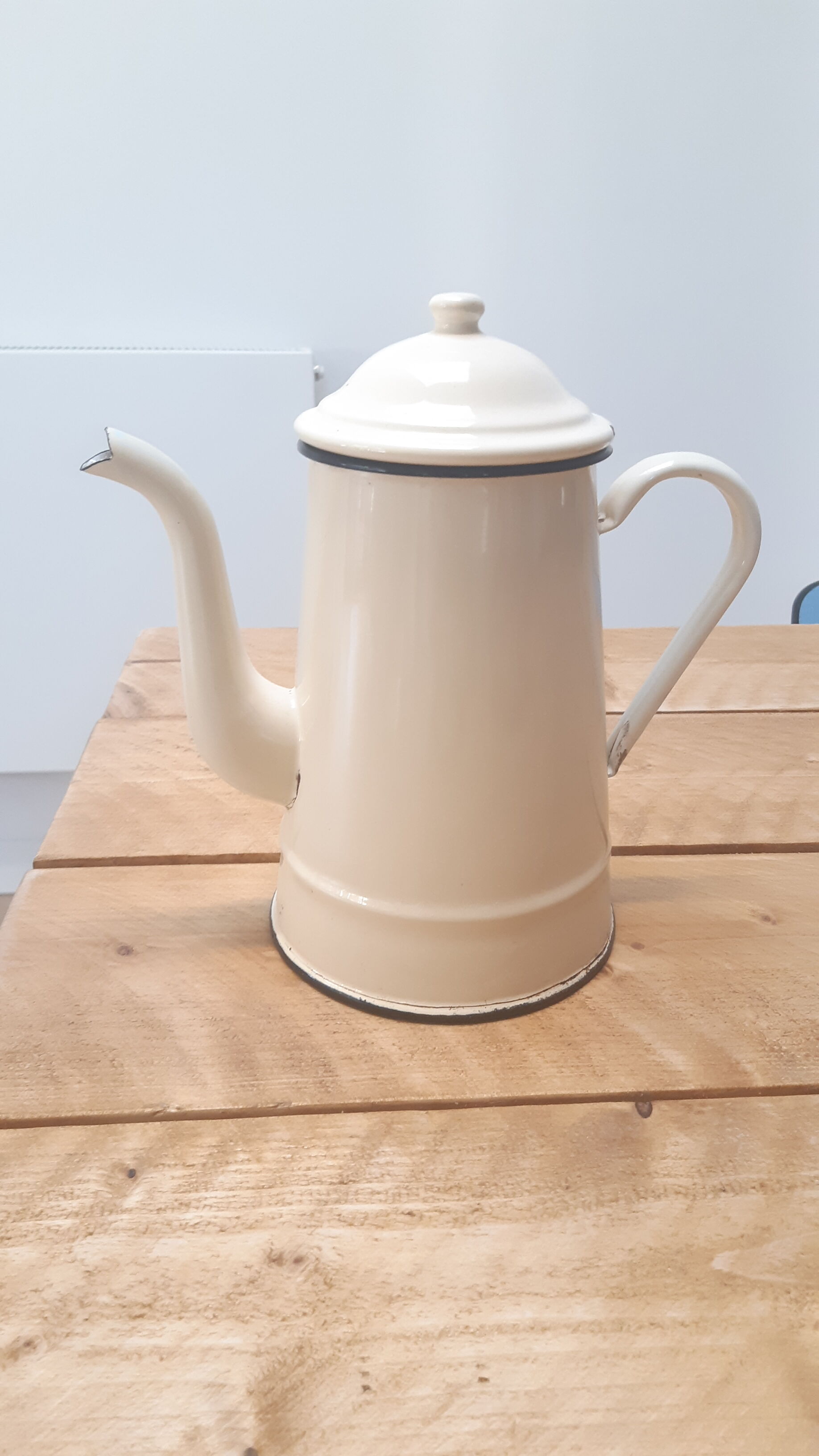 Cream metal teapot