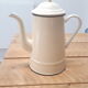 Cream metal teapot