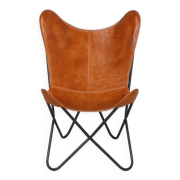 Handmade leather butterfly chair, modern lounge seating.