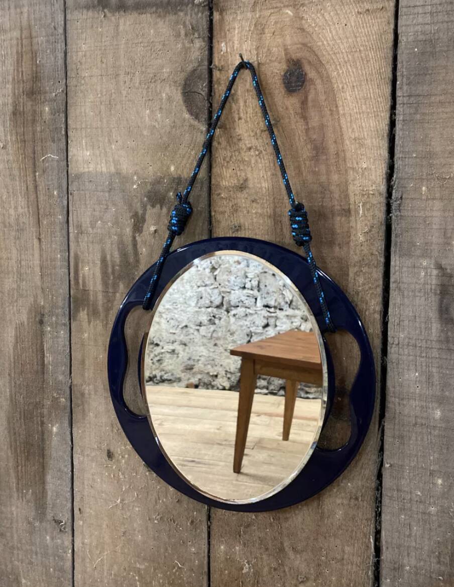 Small round wall mirror in dark blue bakelite 1960