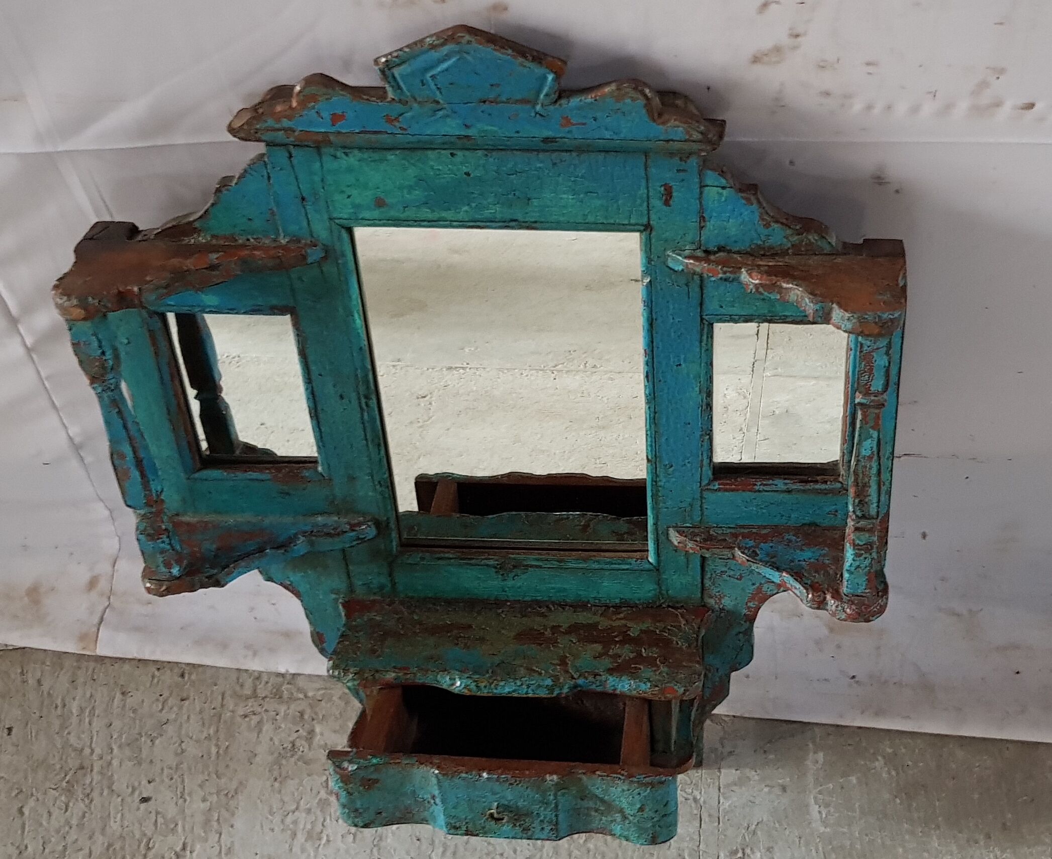 Old mirror-wall shelf in teak