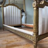 Pair of late 19th-century gilded wooden beds in Louis XVI style.