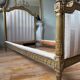 Pair of late 19th-century gilded wooden beds in Louis XVI style.