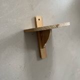 Small wall-mounted wooden shelf