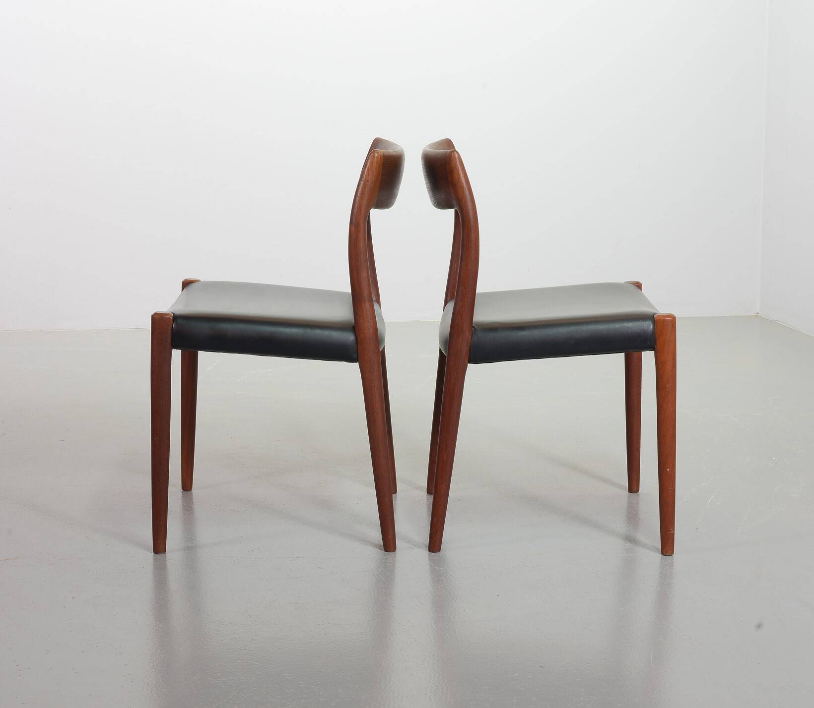 Niels Otto Moller Teak Wooden with Black Leather Dining Chairs, Model 77