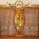 Three-piece bergère set in walnut, Chinoiserie style, from the 1920s, in need of restoration.