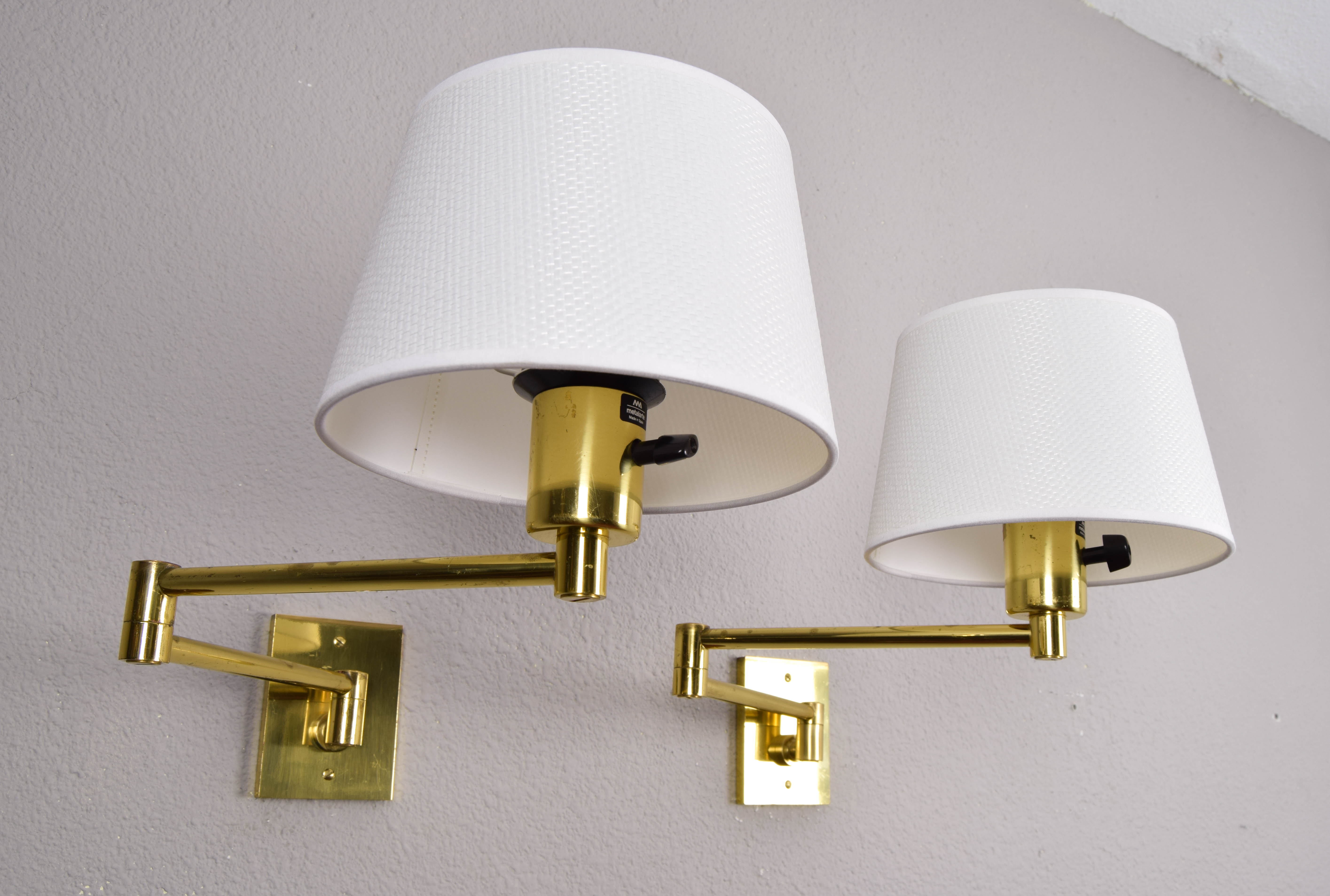 Two Mid-Century Modern Swing Arm Brass Sconces by George W Hansen for Metalarte