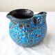 Blue milk jug