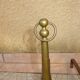 Brass andirons