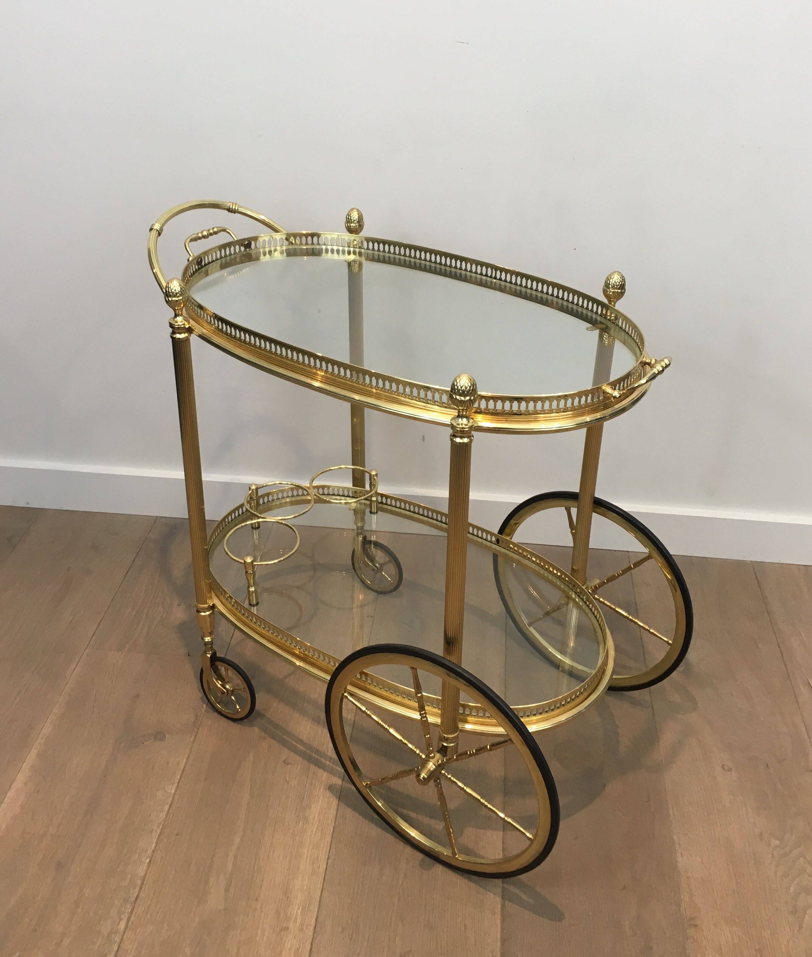 Oval brass trolley from Maison Baguès.
