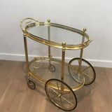 Oval brass trolley from Maison Baguès.