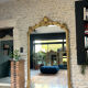 Gold leaf mirror with pediments, 219/131cm, overmantel.
