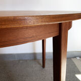 Extendable swedish round teak dining table