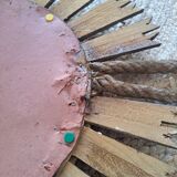 Old large sun mirror in gilded wood