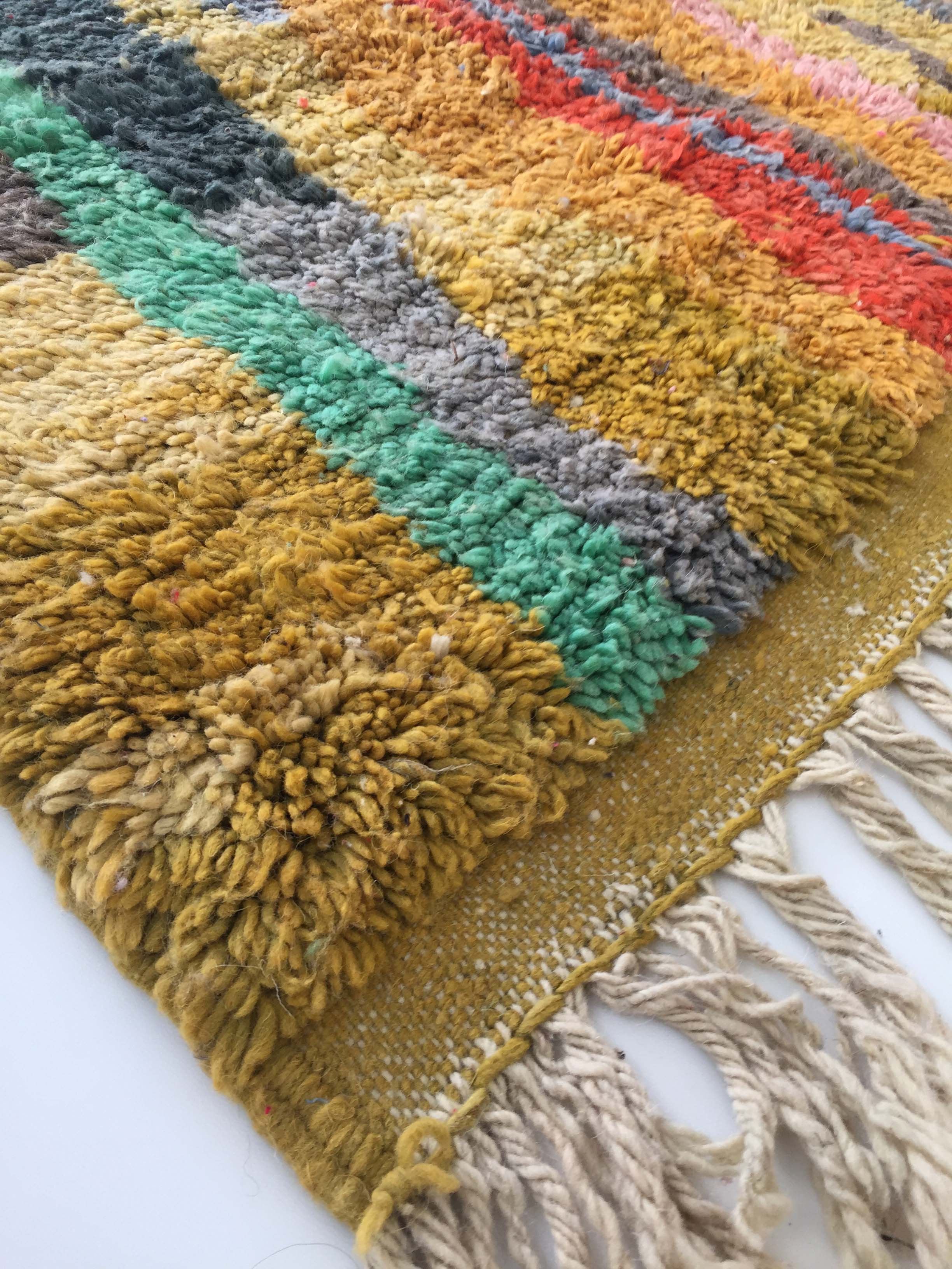 Moroccan Berber carpet Boujaad ochre with colorful patterns 253x142cm