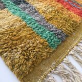 Moroccan Berber carpet Boujaad ochre with colorful patterns 253x142cm