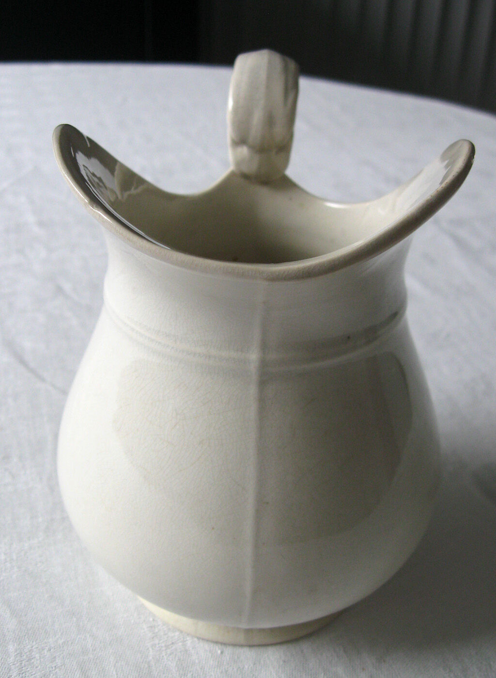 Old toilet bro in white earthenware