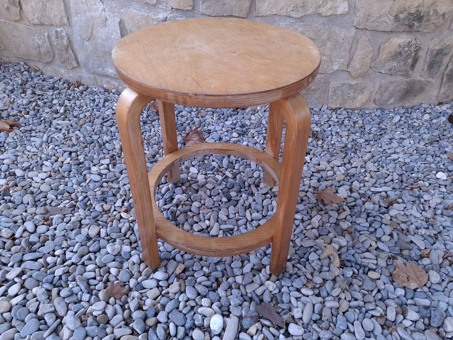 Vintage curved wooden stool
