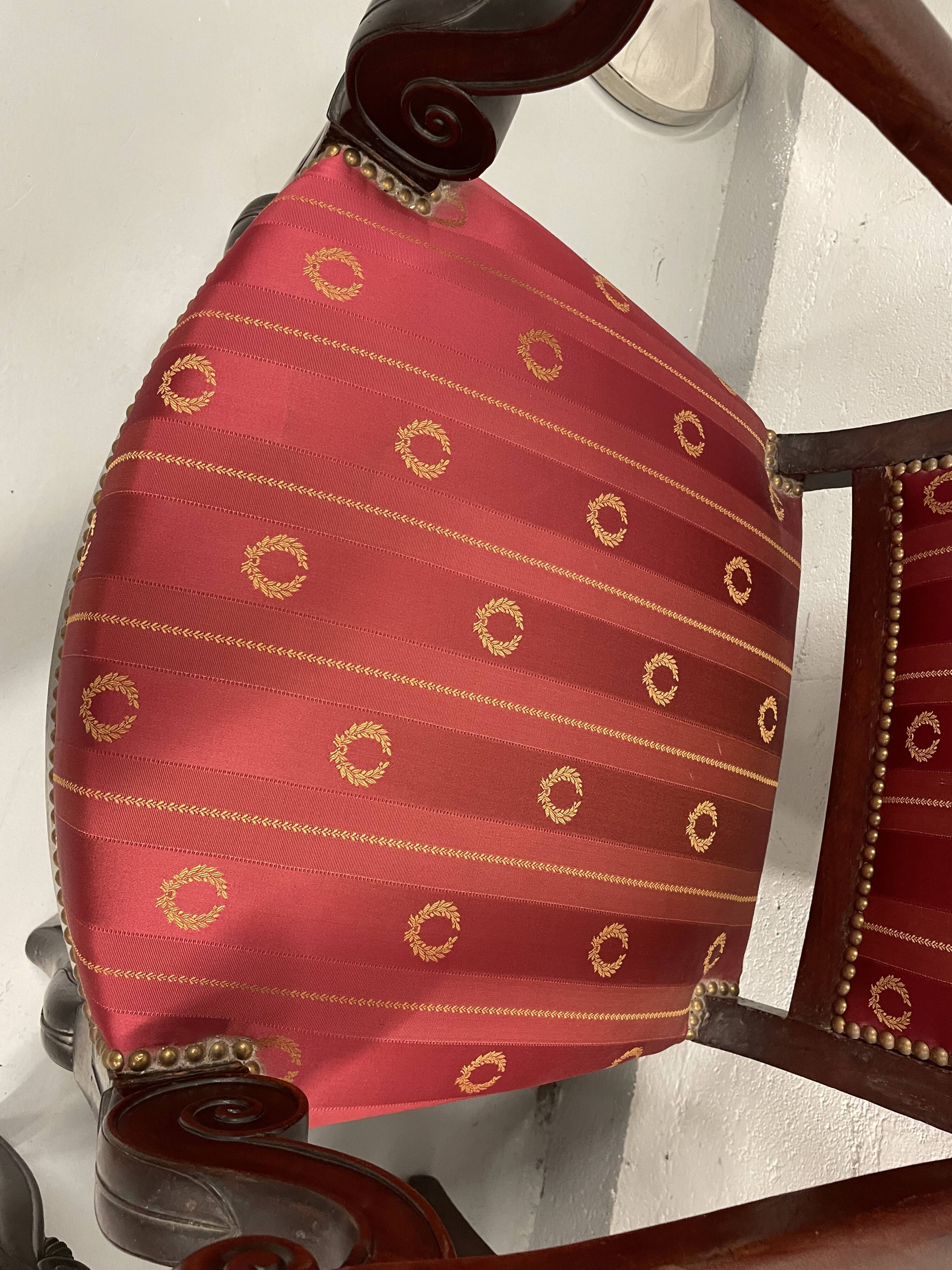 Pair of empire period armchairs in mahogany and silk