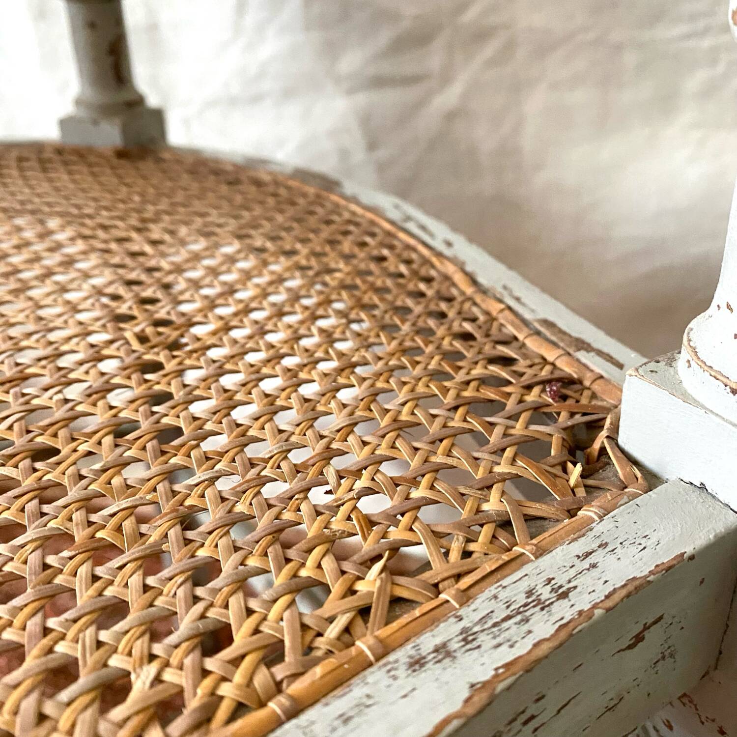 19th-century corner fireplace armchair, wood and cane.