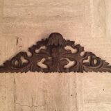 Former finely carved wooden pediment
