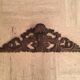 Former finely carved wooden pediment