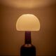 Mid-century modern table lamp by Jaap Ravelli, ceramic base and glass shade.