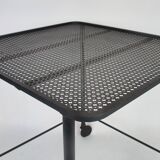 Mathieu Mategot's black wheelie table, 1950