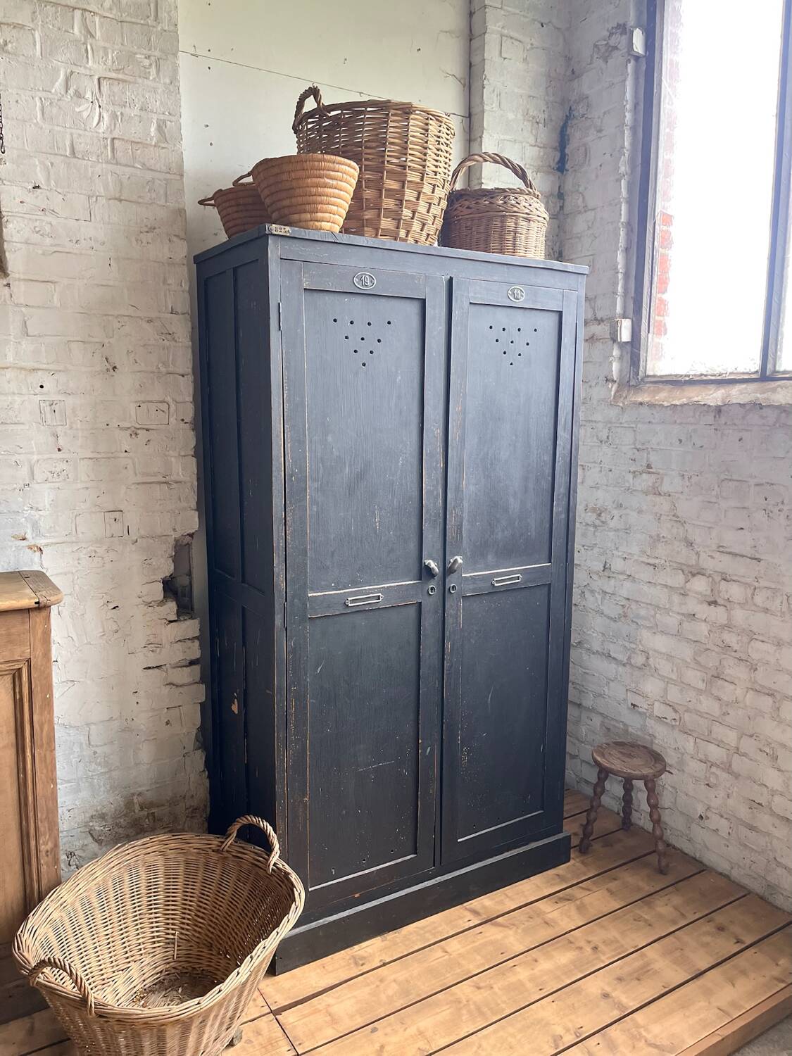 Old wooden locker with black patina