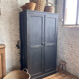 Old wooden locker with black patina