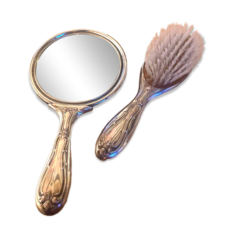 Silver metal hand mirror and laundry brush