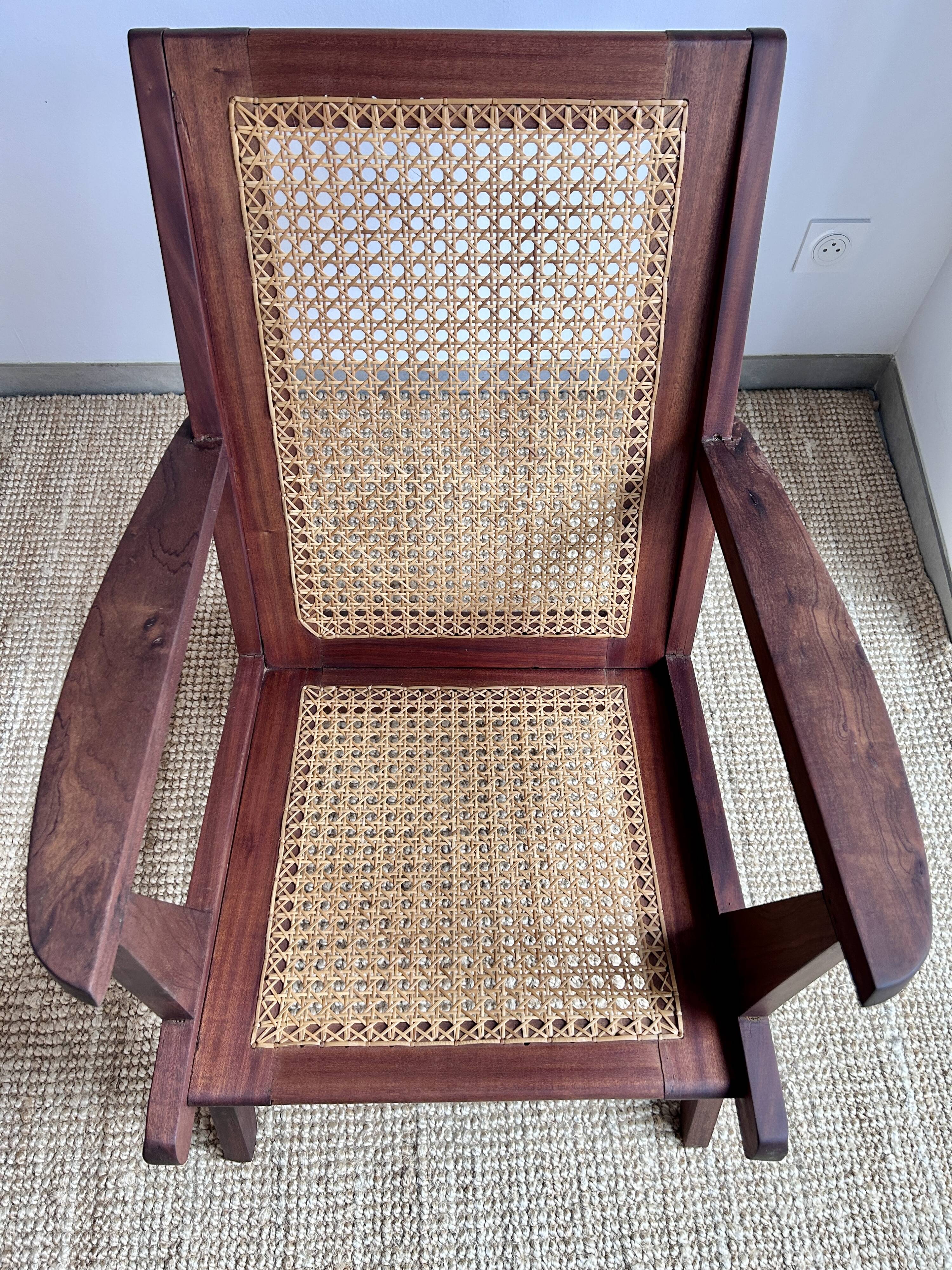 Reconstruction armchair in teak and caning