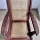Reconstruction armchair in teak and caning