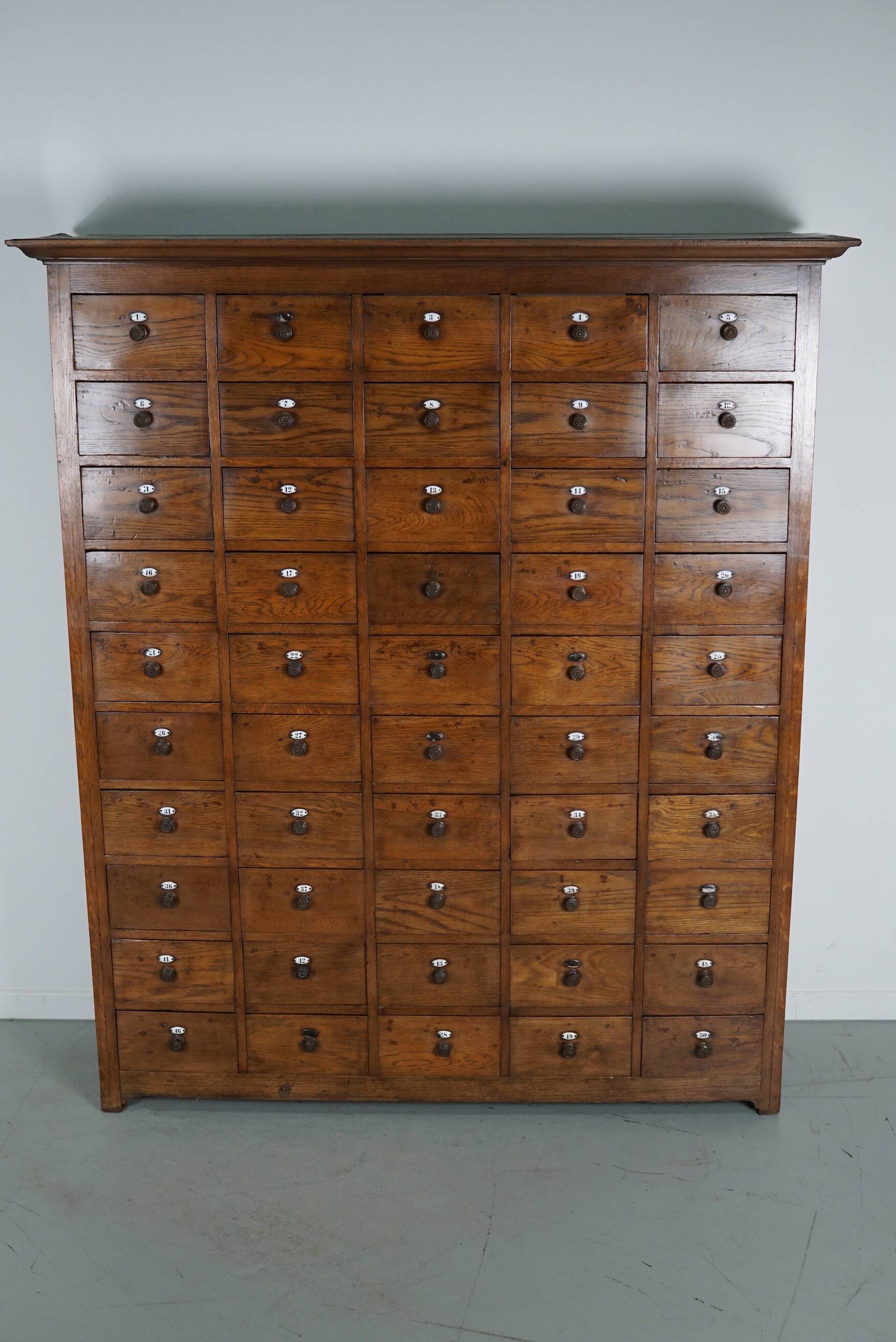 Large dutch oak apothecary cabinet / barber cabinet with enamel shields, 1900s