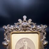Old photograph of a man in a spelter frame