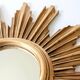 Vintage sunburst mirror in wood and gold resin, 1960s–70s