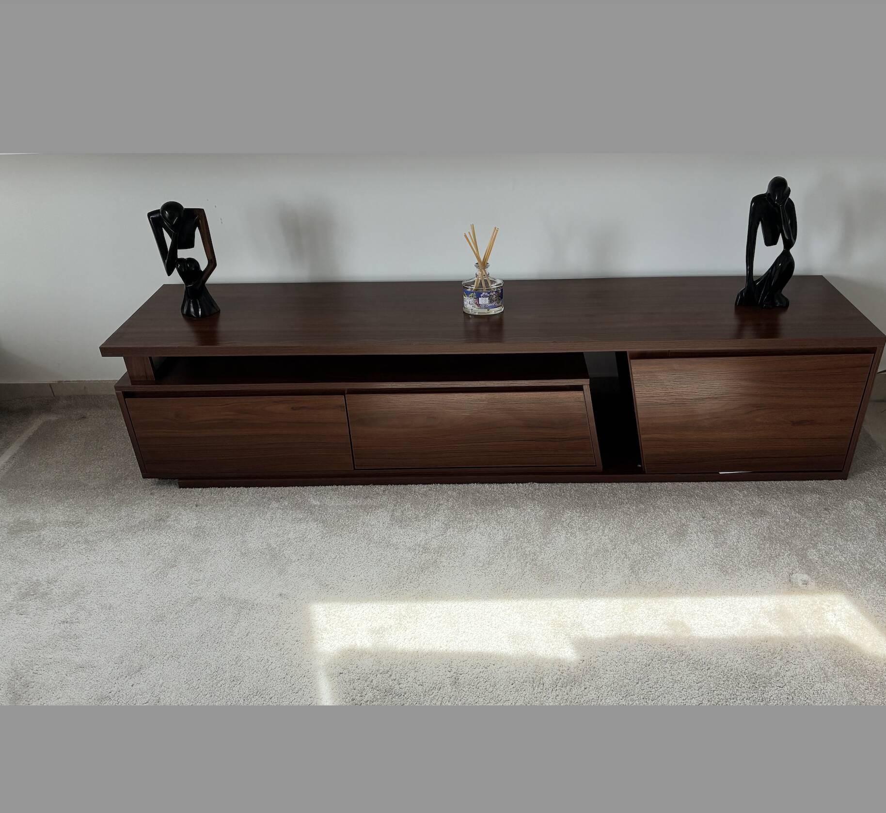 Extendable TV cabinet with walnut finish
