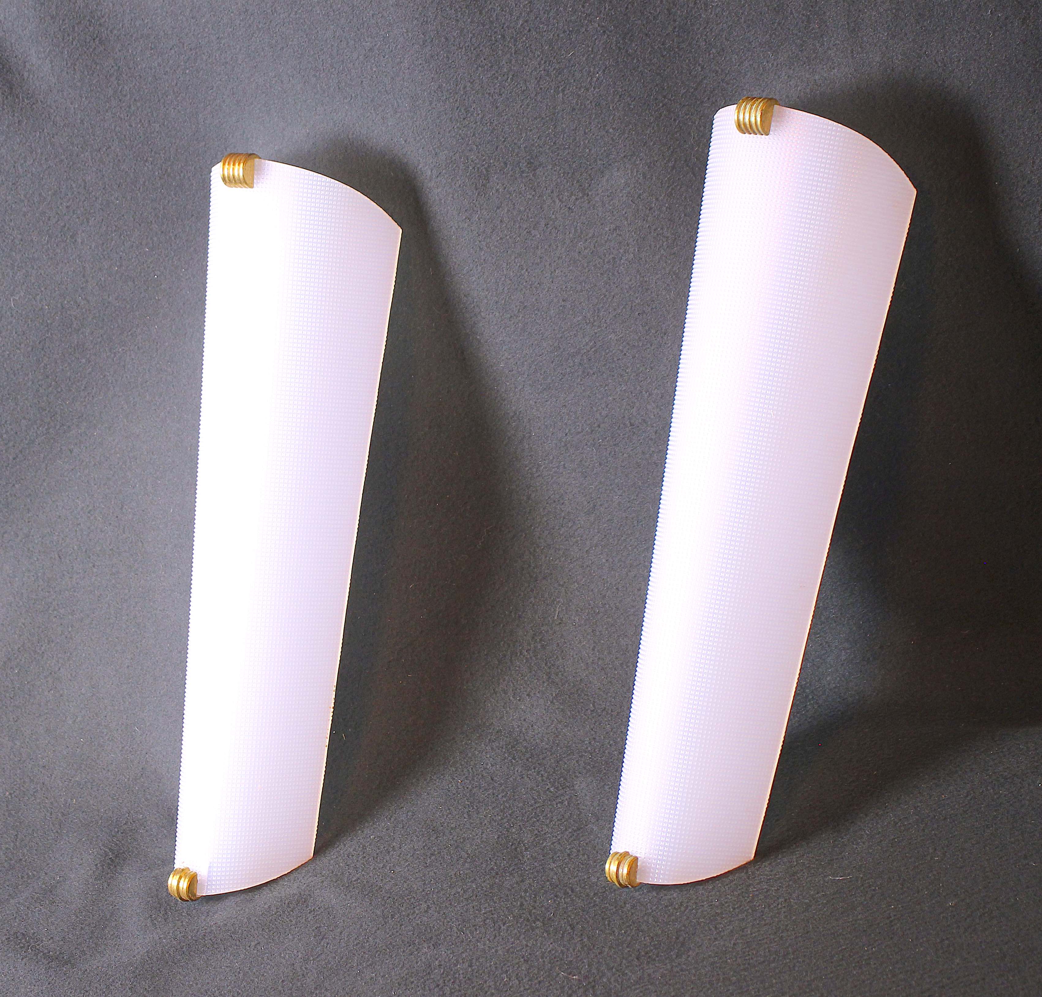 Pair of perspex wall lights with brass detail mid-century France