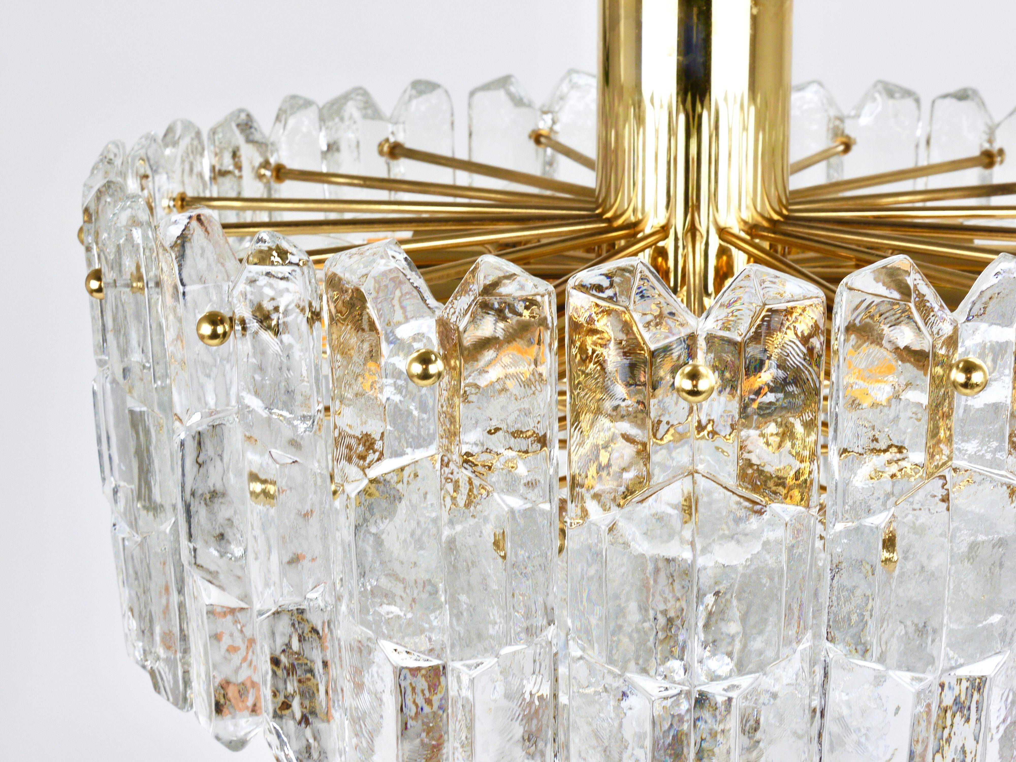 Large ceiling chandelier in gilded brass and glass Palazzo J.T. Kalmar, 1950s