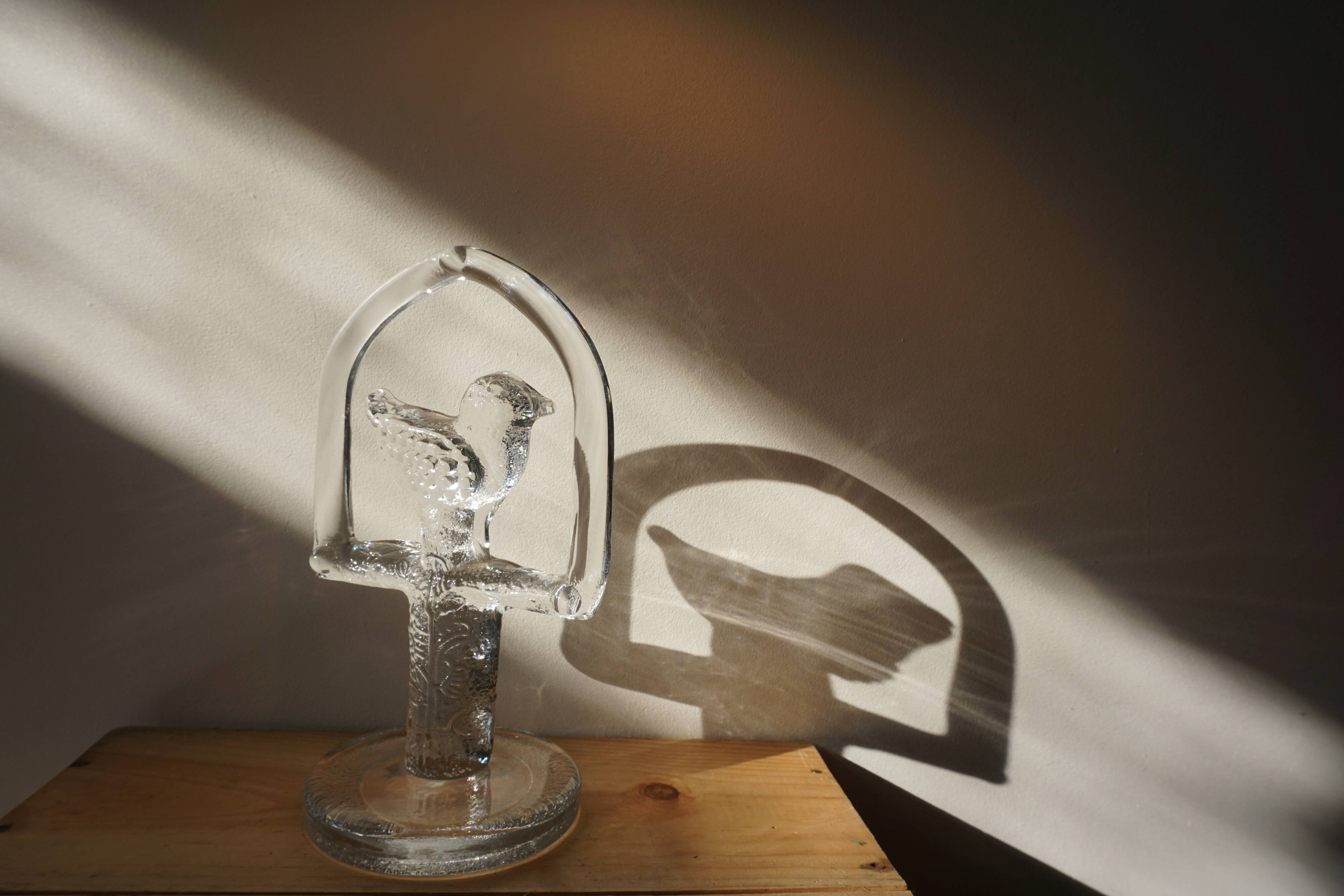 Glass bird suncatcher sculpture