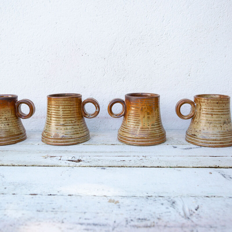 4 sandstone cups signed Jean Pierre Prudhomme